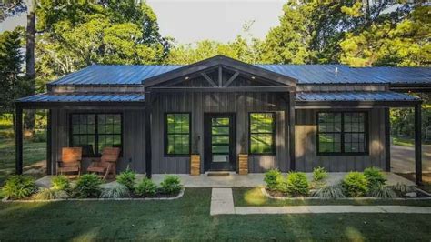 metal clad tiny house fold down deck|tiny metal house ideas.